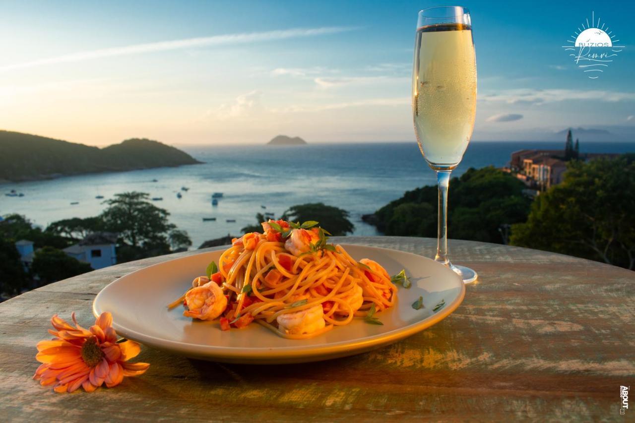 Pousada Praia Joao Fernandes Armacao dos Buzios Exterior photo A glass of Prosecco with a meal