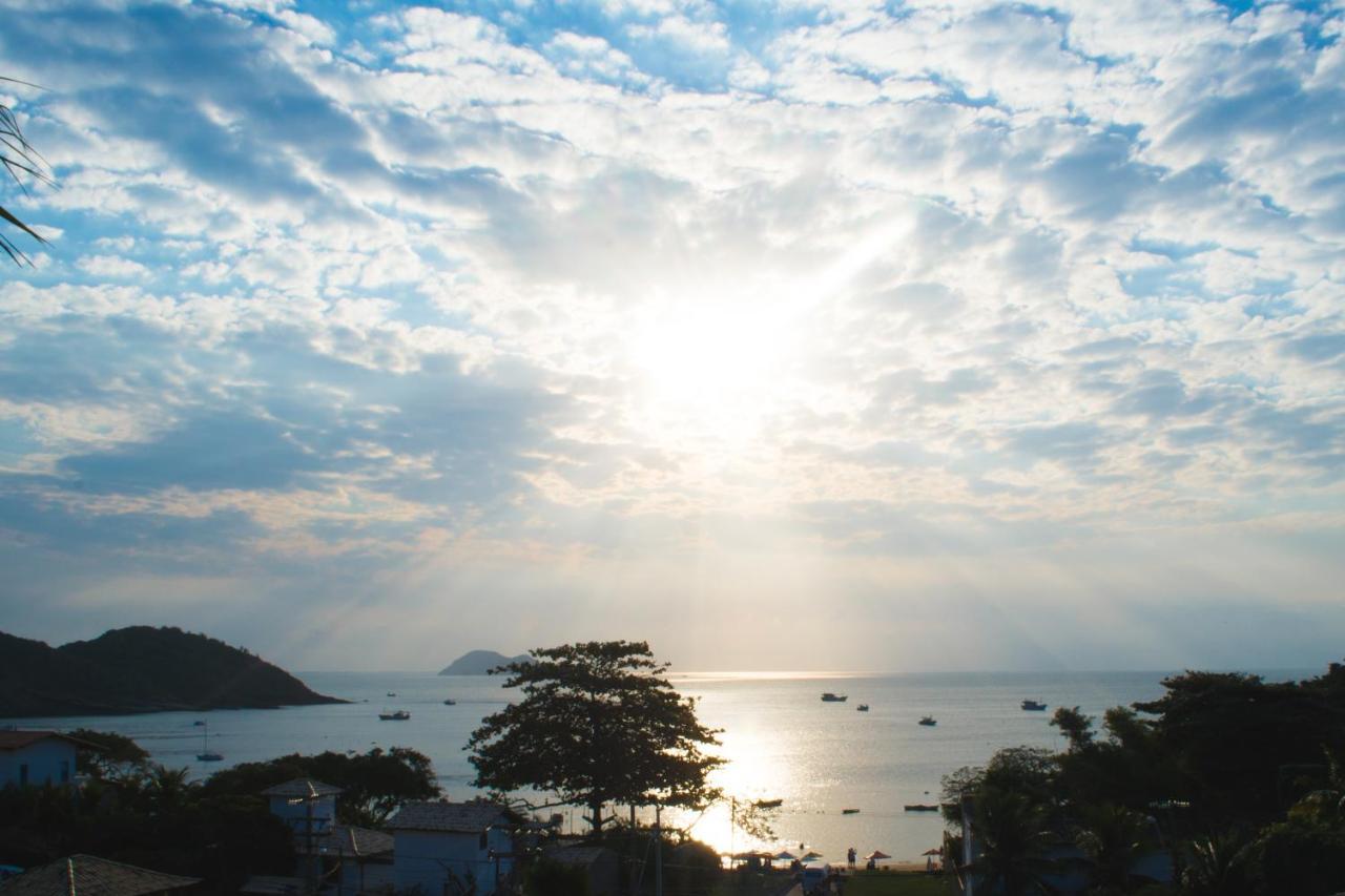 Pousada Praia Joao Fernandes Armacao dos Buzios Exterior photo Sunset over the Gulf of Akaba